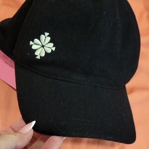 Kate Spade Black Hat with Cream Emblem